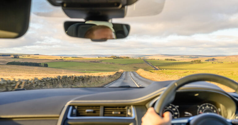 Driving In A Car Through The Countryside